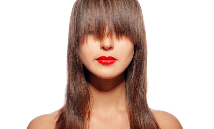 Go-to hairstyles for growing out your bangs