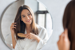 Here are four tips for transitioning to a natural hair care routine.