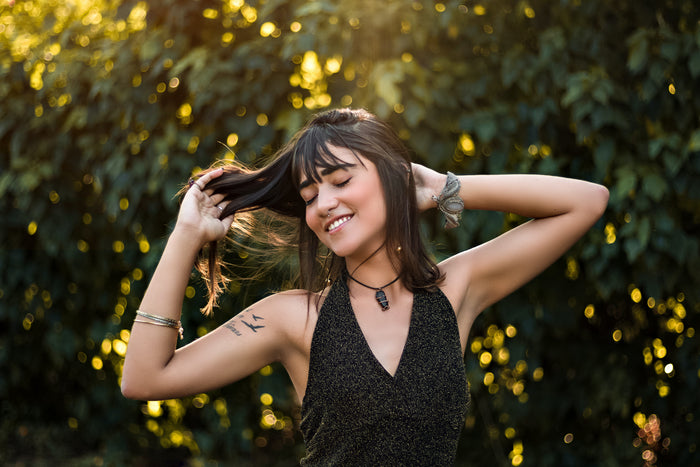 Happy woman with PH balanced hair