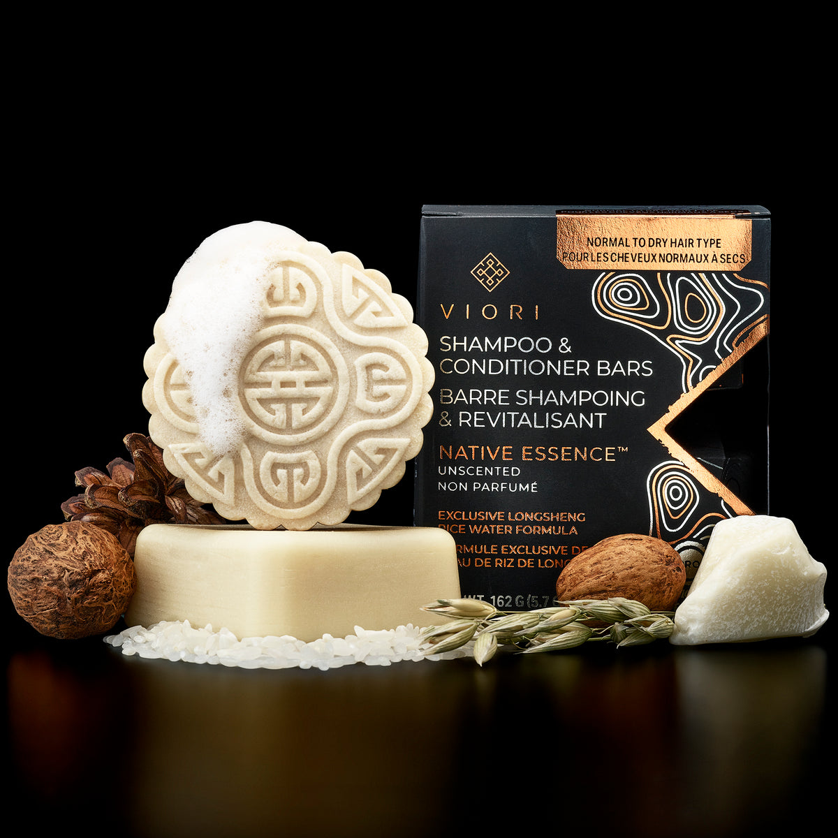 Native Essence shampoo and conditioner bars with their box, nutmeg and rice