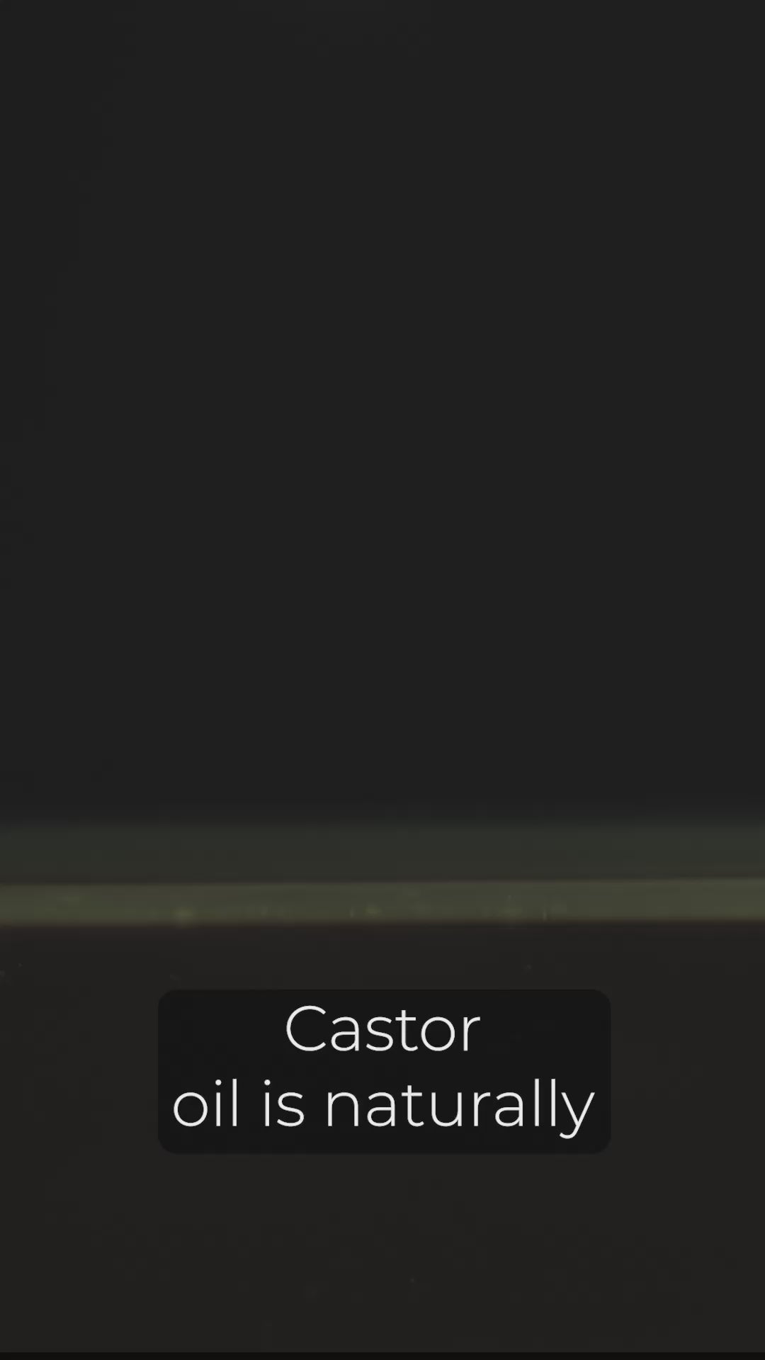 Video: dark opening frame, captioned "Castor oil is naturally"
